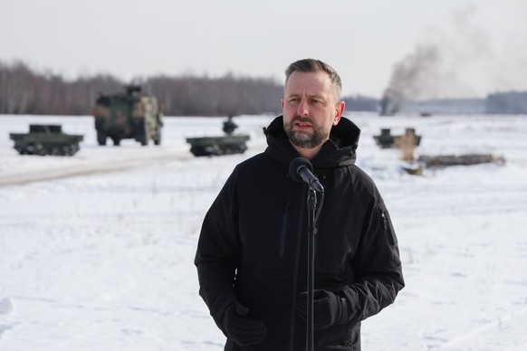 epa12756533 Deputy Prime Minister, Minister of National Defence Wladyslaw Kosiniak-Kamysz during a statement for the media at the Military Institute of Armament Technology training ground in Zielonka, ...
