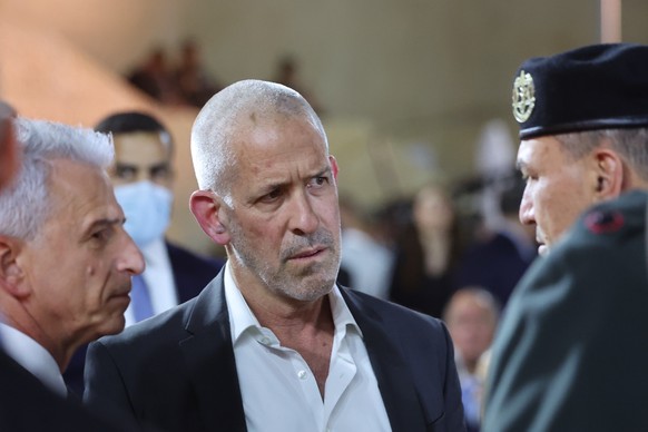 epa12061122 (FILE) - Director of the Israeli Security Agency (Shin Bet) Ronen Bar (C) speaks with Chief of the General Staff of the Israel Defense Forces (IDF) Eyal Zamir (R) and Mossad director David ...