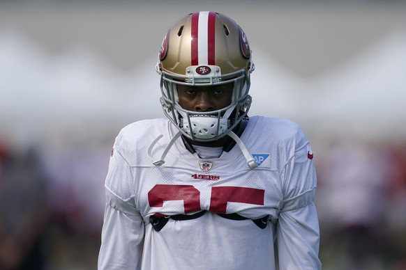 San Francisco 49ers defensive back Richard Sherman walks on the field during NFL football practice in Santa Clara, Calif., Saturday, Aug. 22, 2020. (AP Photo/Jeff Chiu, Pool)