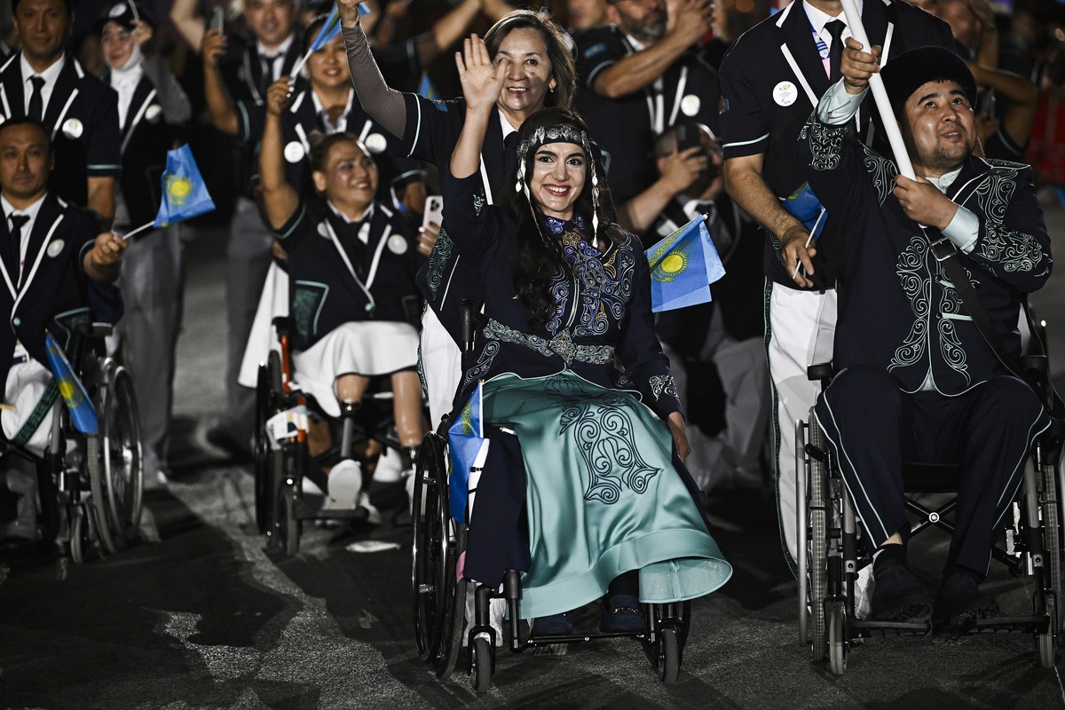 Kazakhstan's delegation arrives during the Parade of Nations as part of the Paris 2024 Paralympic Opening Ceremony at the Place de la Concorde in Paris, France, Wednesday, Aug. 28, 2024. (Julien  ...