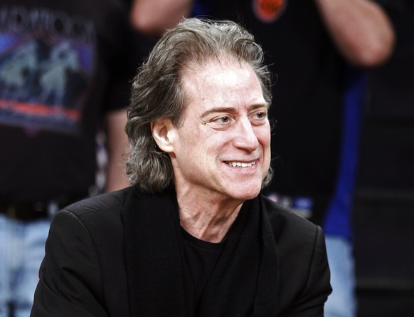 FILE - Comedian Richard Lewis attends an NBA basketball game in Los Angeles in December.  August 25, 2012. Lewis, an acclaimed comedian known for exploring his neuroses in a frantic, stream-of-consciousness tirade…