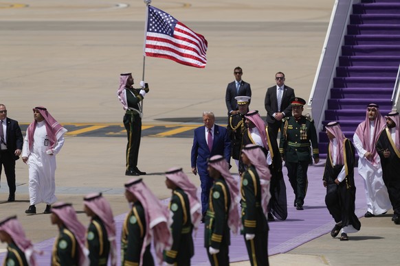 President Donald Trump speaks with Saudi Crown Prince Mohammed bin Salman during an arrival ceremony at the Royal Terminal of King Khalid International Airport in Riyadh, Saudi Arabia, Tuesday, May 13 ...