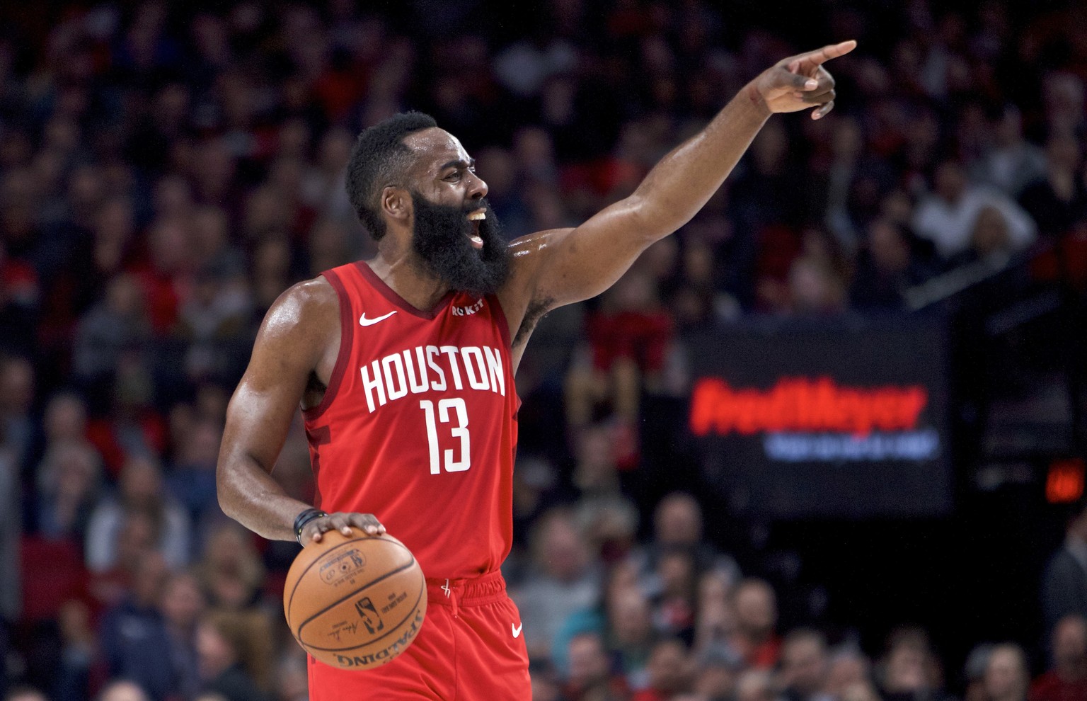 Houston Rockets guard James Harden gestures during the first half of an NBA basketball game against the Portland Trail Blazers in Portland, Ore., Saturday, Jan. 5, 2019. (AP Photo/Craig Mitchelldyer)