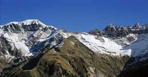 ARCHIVE - DUE TO THE PLANE CRASH ON THE MOUNT PIZ SEGNAS ---- Mount Piz Segnas, left, and the Tschingel Horn mountains, right, with the Martin's Hole near Elm in the canton of Glarus, Switzerland, pic ...