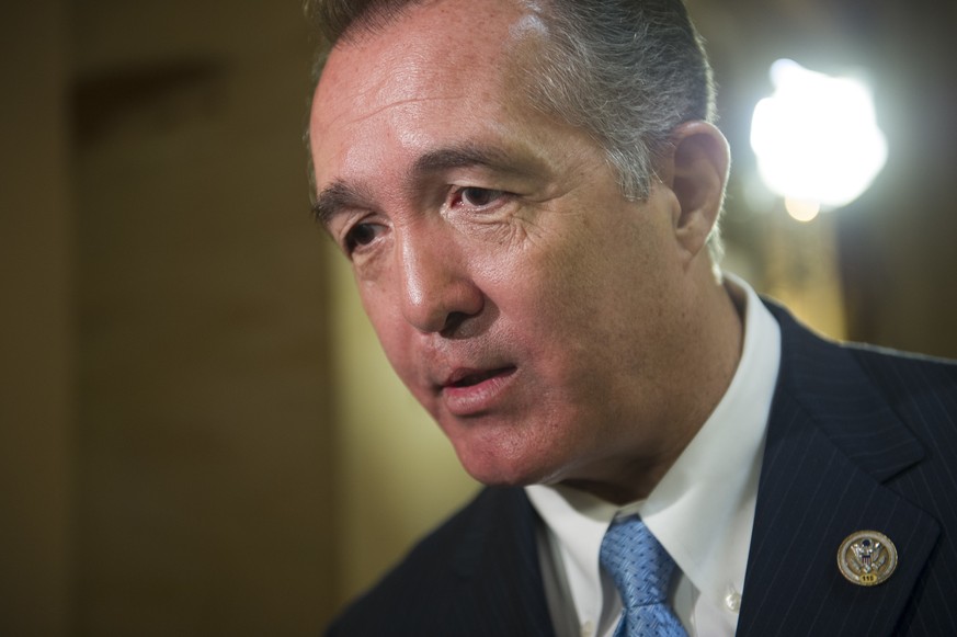 FILE - In this March 24, 2017, file photo, Rep. Trent Franks, R-Ariz. speaks with a reporter on Capitol Hill in Washington. Franks is calling on special counsel Robert Mueller to resign, citing what h ...