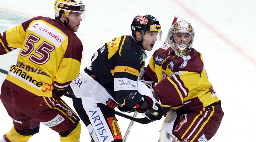 McLean im Sandwich der Genfer Vukovic und Goalie Mayer.