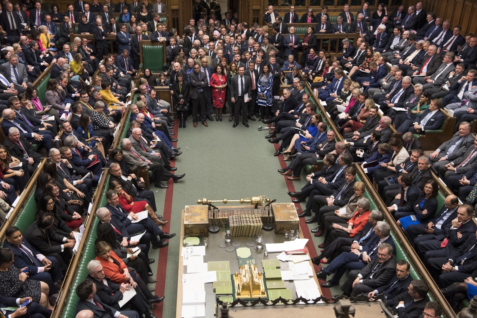 Lawmakers in the House of Commons, London, with Britain&#039;s Prime Minister Theresa May at center right front row, Tuesday March 12, 2019. With just 17 days to go, Britain&#039;s departure from the  ...