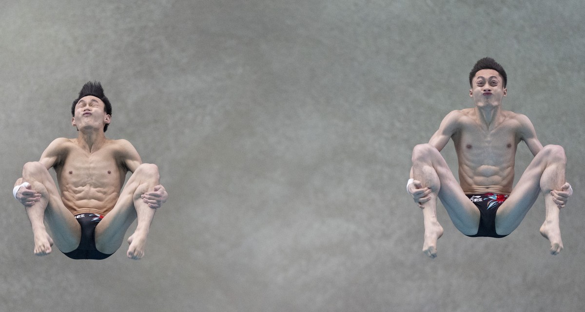 Lian Junjie and Yang Hao, of China, compete during the men's 10m synchronized platform final at the diving World Cup in Montreal, Sunday, March 3, 2024. (Christinne Muschi/The Canadian Press via  ...