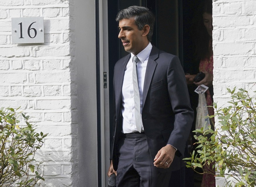 Rishi Sunak leaves his house, on the day the result of the Conservative Party leadership election is set to be announced, in London, Monday, Sept. 5, 2022. Britain finally learns who its next prime mi ...