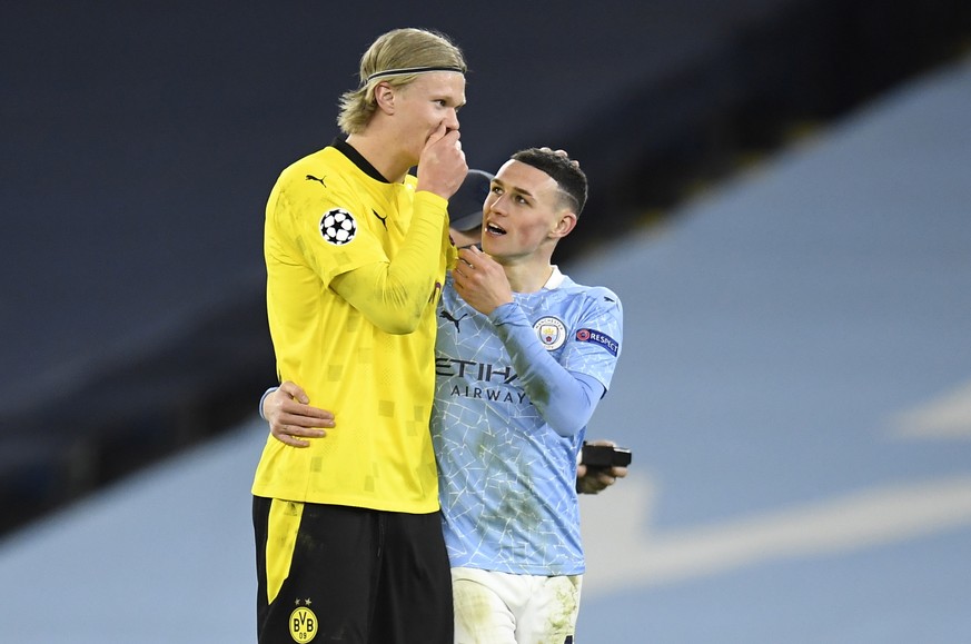 epa09119469 Phil Foden (R) of Manchester City and Erling Haaland of Dortmund chat after the UEFA Champions League quarterfinal, 1st leg soccer match between Manchester City and Borussia Dortmund in Ma ...