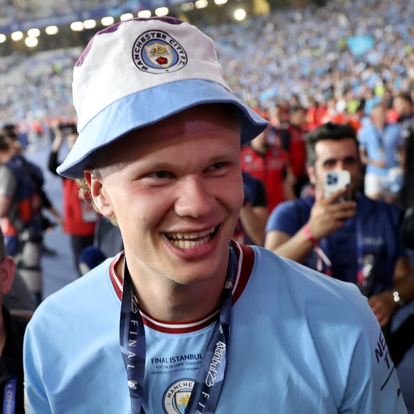 epa10684522 Manchester City player Erling Haaland celebrates after the team won the UEFA Champions League Final soccer match between Manchester City and Inter Milan, in Istanbul, Turkey, 10 June 2023. ...