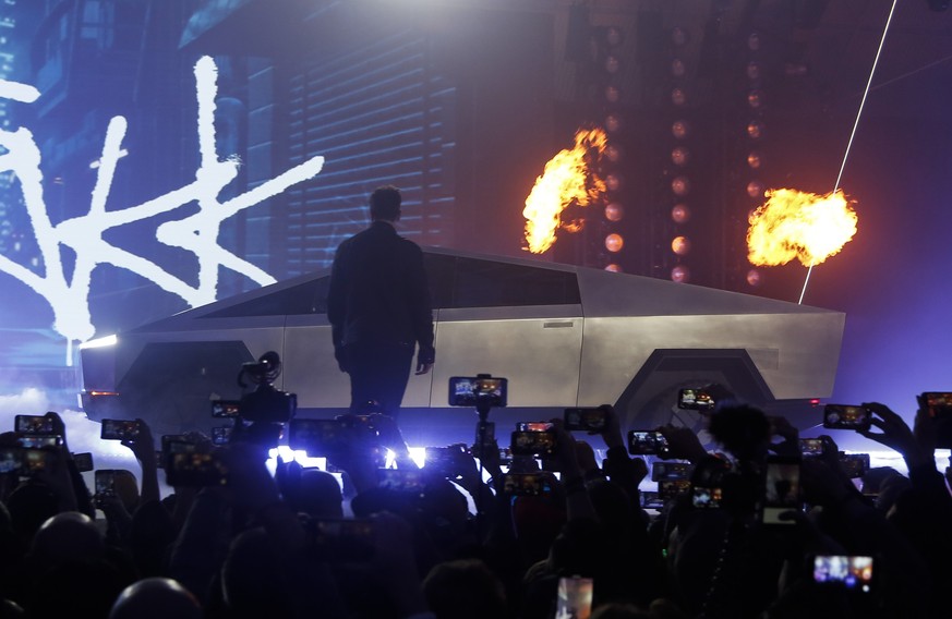 Tesla CEO Elon Musk introduces the Cybertruck at Tesla&#039;s design studio Thursday, Nov. 21, 2019, in Hawthorne, Calif. (AP Photo/Ringo H.W. Chiu)
Elon Musk