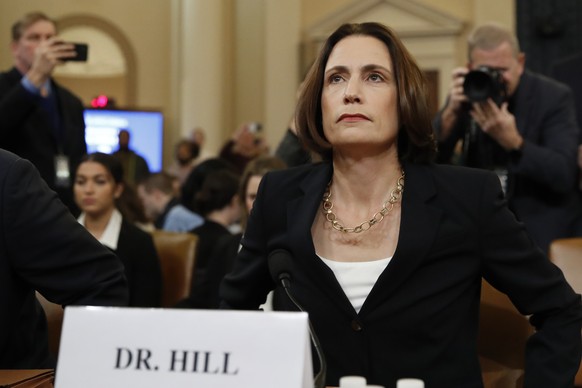 Former White House national security aide Fiona Hill, arrives to testify before the House Intelligence Committee on Capitol Hill in Washington, Thursday, Nov. 21, 2019, during a public impeachment hea ...