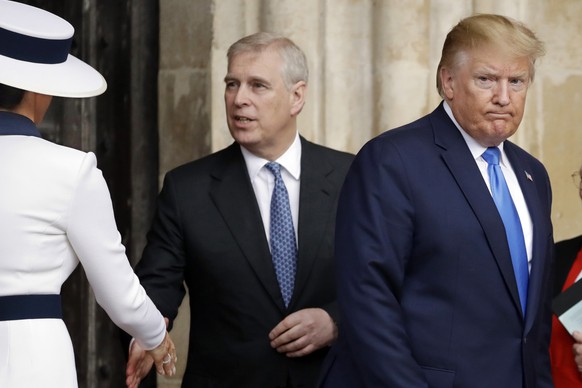 FILE - President Donald Trump, right, and first lady Melania Trump, left, accompanied by Britain&#039;s Prince Andrew, leave after a tour of Westminster Abbey in London, June 3, 2019. Social media is  ...