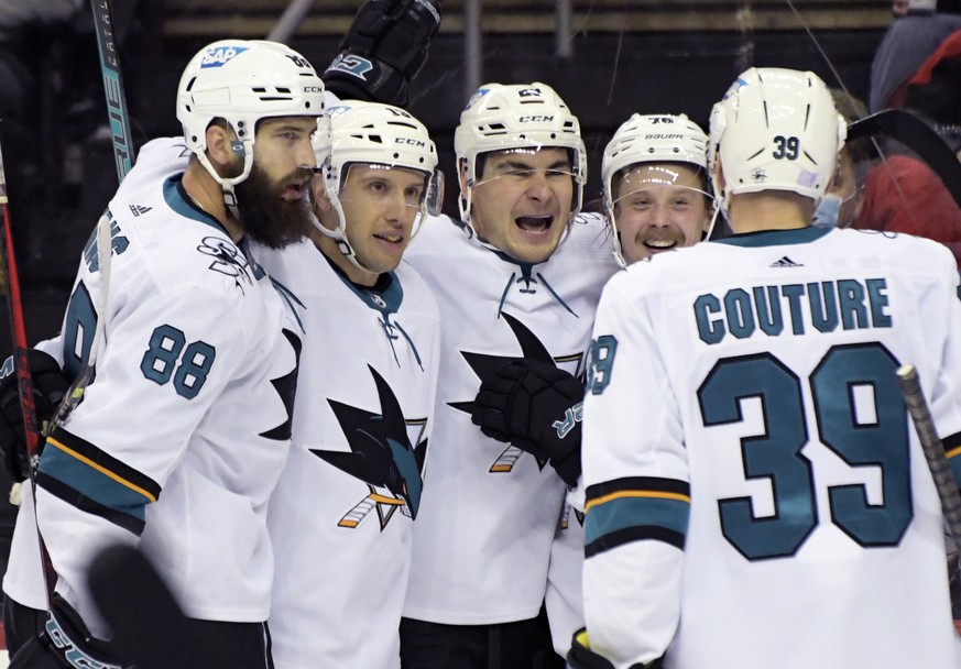 San Jose Sharks right wing Timo Meier (28) celebrates his goal with teammates during the second period of an NHL hockey game against the New Jersey Devils, Tuesday, Nov. 30, 2021, in Newark, N.J. (AP  ...