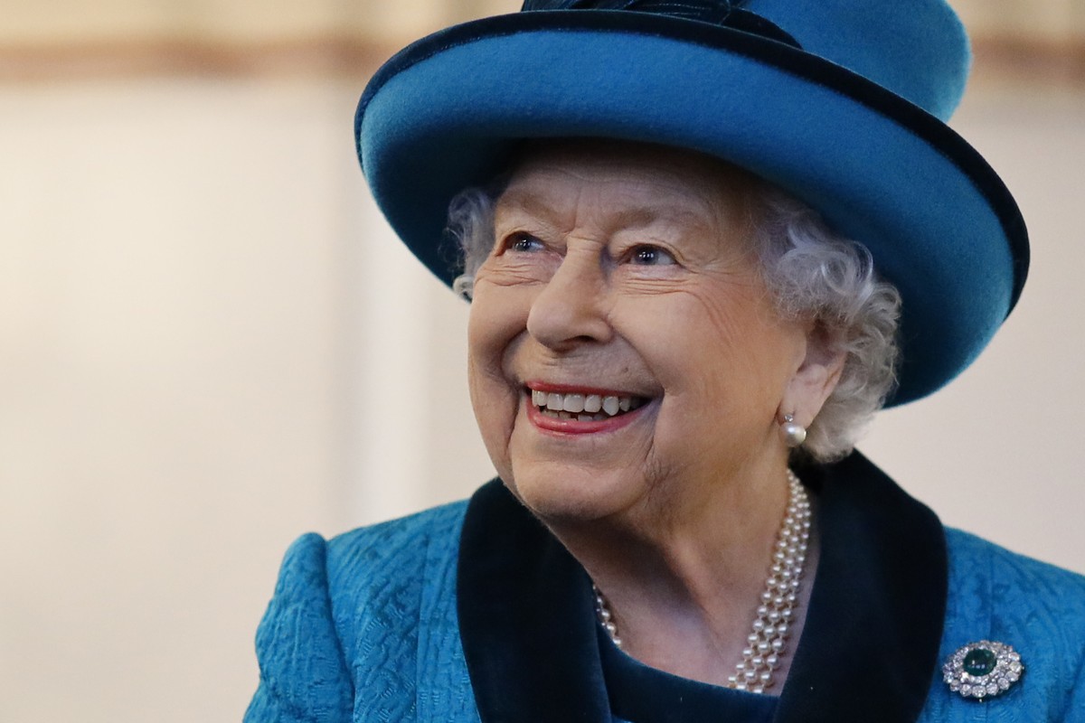 Britain's Queen Elizabeth II visits the new headquarters of the Royal Philatelic society in London Tuesday Nov. 26, 2019. The Royal Philatelic society holds an archive of documents covering every ...