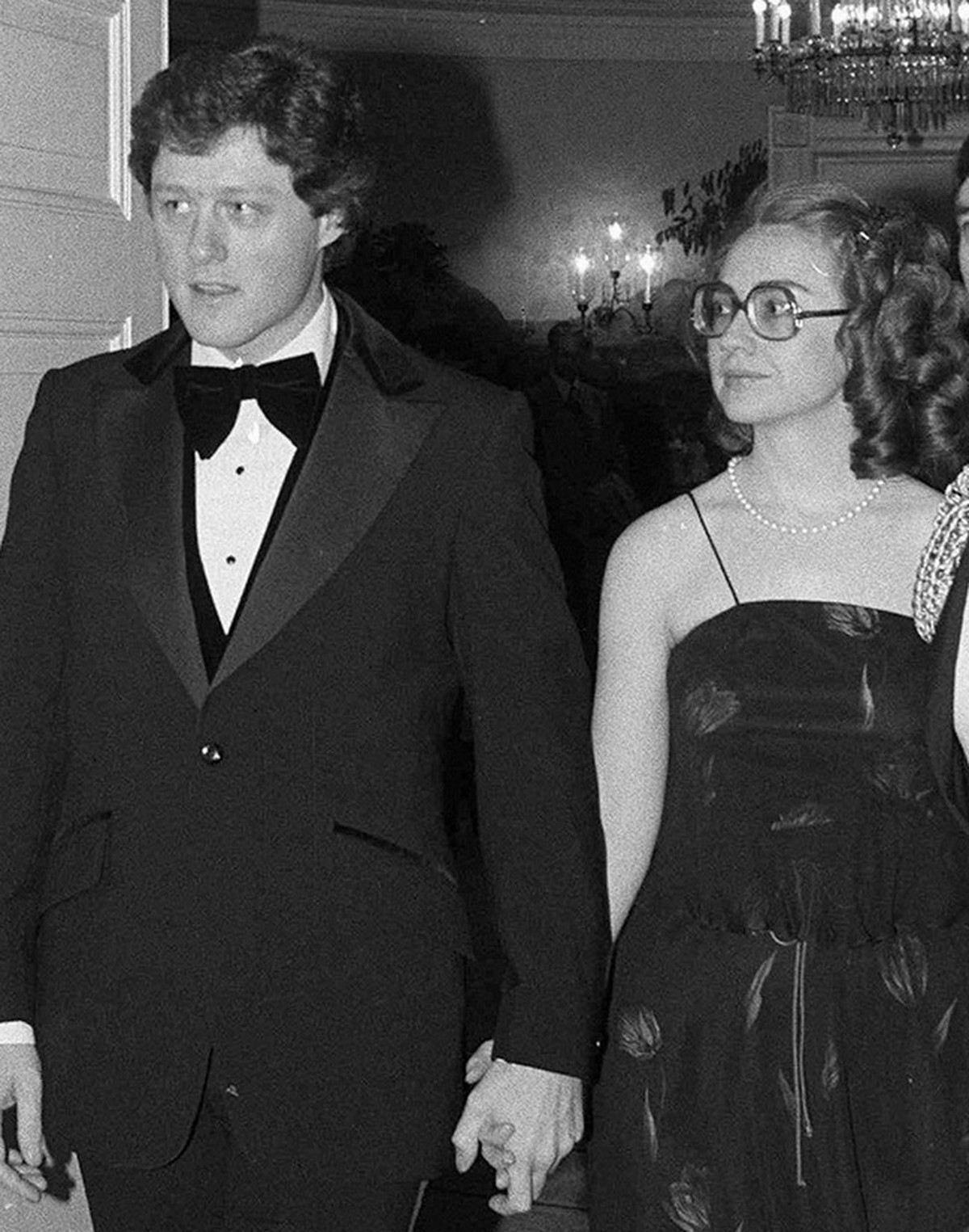 FILE - In this Feb. 27, 1979 file photo, Arkansas Gov. Bill Clinton and his wife, Hillary, enter the White House in Washington to attend a dinner honoring the nation's governors. (AP Photo/Barry  ...