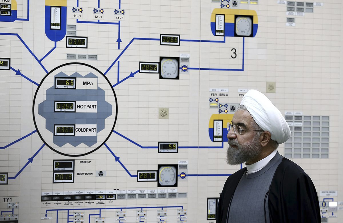FILE - In this Jan. 13, 2015, file photo released by the Iranian President's Office, President Hassan Rouhani visits the Bushehr nuclear power plant just outside of Bushehr, Iran. Rouhani is repo ...