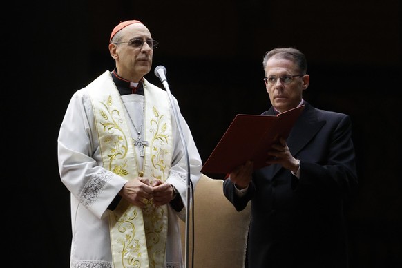 epa11931114 Cardinal Victor Manuel Fernandez (L) leads a Rosary prayer for the health of Pope Francis who is hospitalized with pneumonia, St. Peter&#039;s Square, Vatican City, 28 February 2025. Pope  ...
