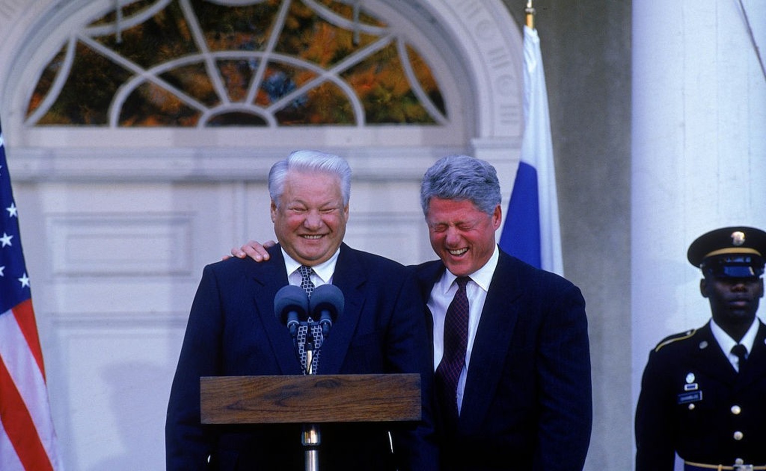 Pres. Bill Clinton bantering w. Boris Yeltsin (L), at mikes in summit briefing during Russian Pres.'s visit for UN 50th anniv. fete, at FDR's estate. (Photo by Diana Walker/Getty Images)