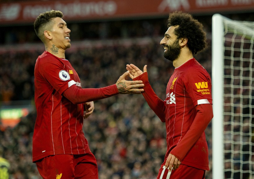 epa08185489 Liverpool&#039;s Mohamed Salah celebrates after scoring the third goal making the score 3-0 during the English Premier League soccer match between Liverpool and Southampton at Anfield, Liv ...