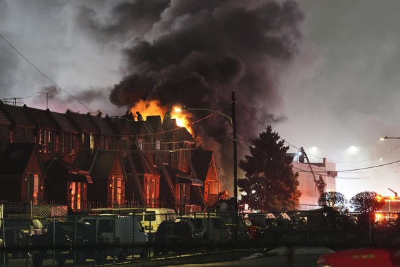 First responders work the scene after a small plane crashed in Philadelphia, Friday, Jan. 31, 2025. (AP Photo/Matt Rourke)