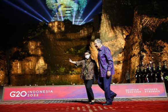 Russian Foreign Minister Sergey Lavrov is escorted at the Welcoming Dinner during G20 Leaders&#039; Summit, at the Garuda Wisnu Kencana Cultural Park, in Badung, Bali, Indonesia, on Tuesday Nov. 15, 2 ...