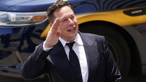 FILE - Tesla CEO Elon Musk departs from the justice center in Wilmington, Del., Tuesday, July 13, 2021. Democrats are hoping to raise revenue for their legislative agenda by taxing the assets of billi ...