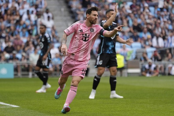 Inter Miami forward Lionel Messi (10) celebrates after scoring a goal during the second half of an MLS soccer match against Minnesota United, Saturday, May 10, 2025, in St. Paul, Minn. (AP Photo/Abbie ...