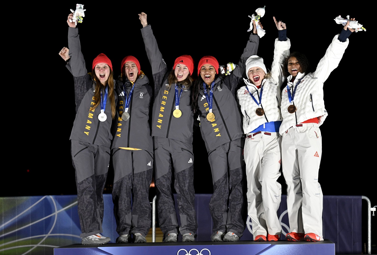epa12766835 Silver medalists Lisa Buckwitz (L) and Neele Schuten of Germany, gold medalists Laura Nolte (centre L) and Deborah Levi of Germany and bronze medalists Kaillie Armbruster Humphries and Jas ...