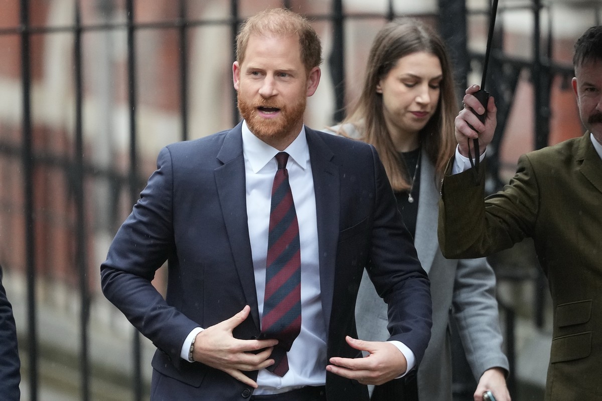 FILE - Britain's Prince Harry arrives at London's High Court to lead a group, including Elton John and Elizabeth Hurley, accusing the Daily Mail's publisher of privacy invasion through  ...