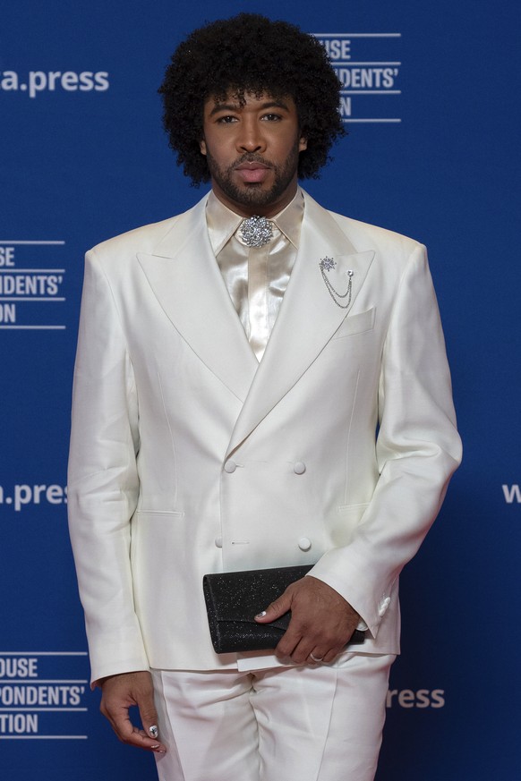 President of the White House Correspondents&#039; Association Eugene Daniels poses for photographers as he arrives at the annual White House Correspondents&#039; Association Dinner in Washington, Satu ...