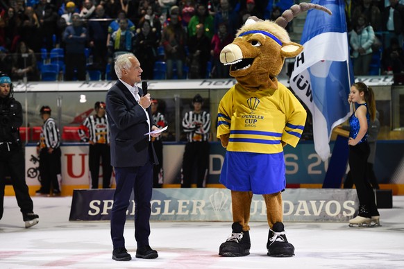 Tarzisius Caviezel, city president of Davos, and mascotte Hitsch, after the final game between Team Canada and HC Ocelari Trinec at the 93th Spengler Cup ice hockey tournament in Davos, Switzerland, T ...