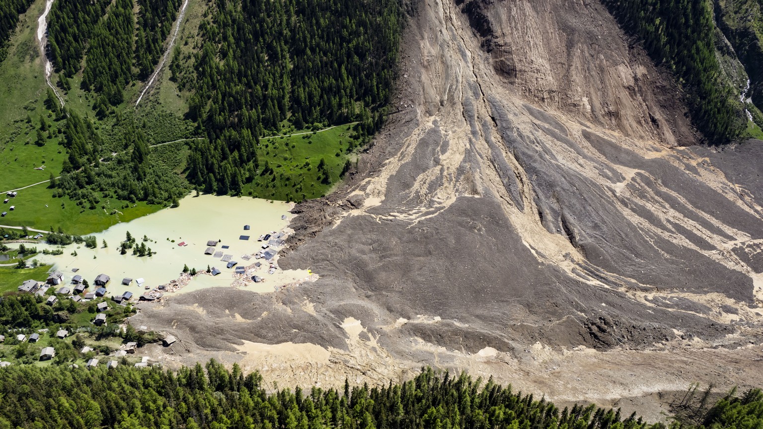 KEYPIX - A aerial view captured one day after a massive avalanche, triggered by the collapse of the Birch Glacier, shows the destruction it caused as it swept down to the valley floor and demolishing  ...