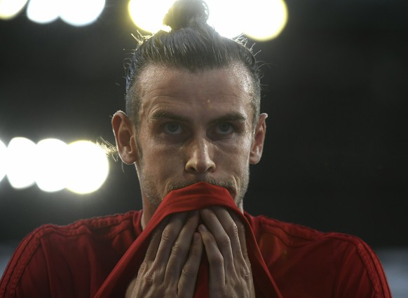 Gareth Bale of Wales warms up prior to the men's soccer 2020 European Championship Group E qualifying match between Hungary and Wales in Groupama Arena in Budapest, Hungary, Tuesday, June 11, 2019. (T ...