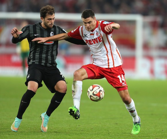 Admir Mehmedi im Kampf mit Kölns Jonas Hector.