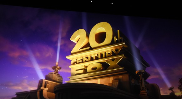 Cathleen Taff, president of distribution, franchise management, business and audience insight for The Walt Disney Studios, speaks underneath the logo for 20th Century Fox during the Walt Disney Studio ...