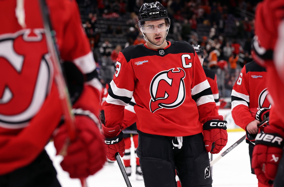 New Jersey Devils center Nico Hischier (13) skates off the ice after the Devils lost to the Philadelphia Flyers in an NHL hockey game Tuesday, April 7, 2026, in Newark, N.J. (AP Photo/Adam Hunger)
Nic ...
