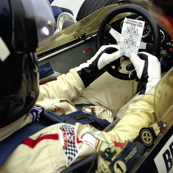 IMAGO / Motorsport Images

1970 German GP HOCKENHEIMRING, GERMANY - AUGUST 02: Graham Hill checks his Firestone tyre pressure during the German GP at Hockenheimring on August 02, 1970 in Hockenheimrin ...