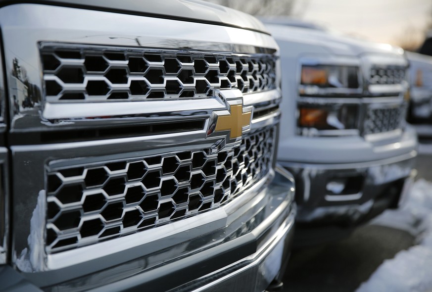 2014 Chevrolet Silverado pick up trucks are pictured in Thurmont, Maryland February 6, 2014. General Motors Co reported a disappointing fourth-quarter profit on Thursday, hurt by weaker-than-expected  ...