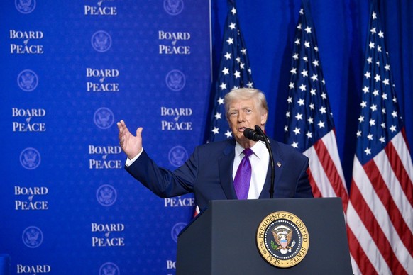 epa12758407 US President Donald Trump speaks during the Board of Peace meeting at the Donald J. Trump U.S. Institute of Peace in Washington, USA, 19 February 2026. Established by Donald Trump and led  ...