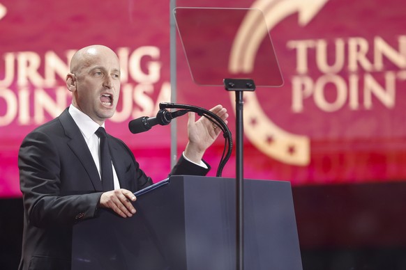 epa12397007 US White House Deputy Chief of Staff Stephen Miller speaks during the public memorial service of political activist Charlie Kirk at State Farm Stadium in Glendale, Arizona, USA, 21 Septemb ...