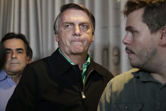 FILE - Brazil&#039;s former President Jair Bolsonaro prepares to speak to the press in Belo Horizonte, Brazil, June 30, 2023, the day that judges ruled him ineligible to run for political office until ...
