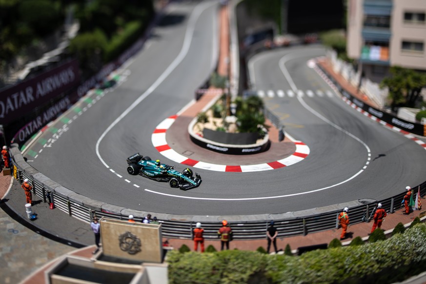epa10997222 A picture taken with a tilt-shift lens shows Spanish Formula One driver Fernando Alonso of Aston Martin in action during the first practice session for the Formula One Grand Prix of Monaco ...