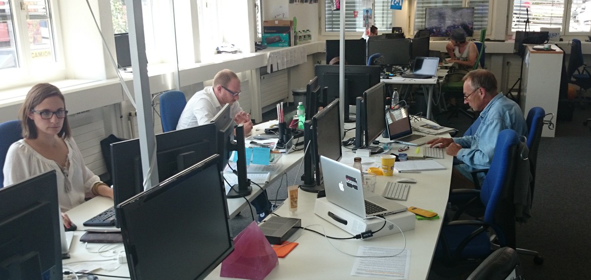 Busy, busy, busy: Newsdesk-Menschen.