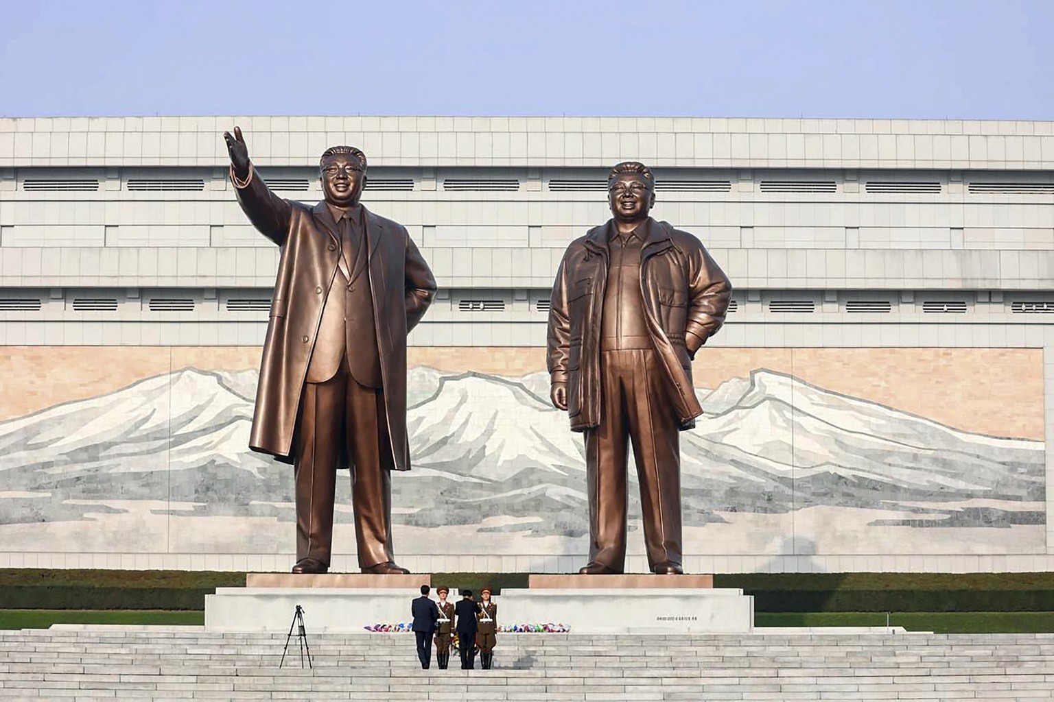 epa10926888 A handout photo provided by the Russian Foreign Ministry's press service shows bronze statues of late North Korean leaders Kim Il Sung and Kim Jong Il at the Mansu Hill Grand Monument.