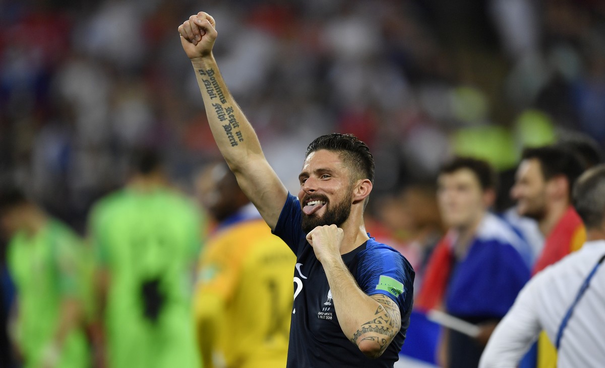 France's Olivier Giroud celebrates after his team won 4-2 during the final match between France and Croatia at the 2018 soccer World Cup in the Luzhniki Stadium in Moscow, Russia, Sunday, July 15 ...