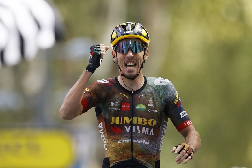 epa10086451 French rider Christophe Laporte of Jumbo Visma celebrates after crossing the finish line to win the 19th stage of the Tour de France 2022 over 188.3km from Castelnau-Magnoac to Cahors, Fra ...