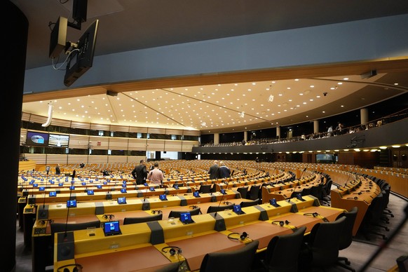 Guest begin to arrive in the chamber prior to a plenary session ahead of Holocaust Remembrance Day at the European Parliament in Brussels on Thursday, Jan. 25, 2023. (AP Photo/Virginia Mayo)
