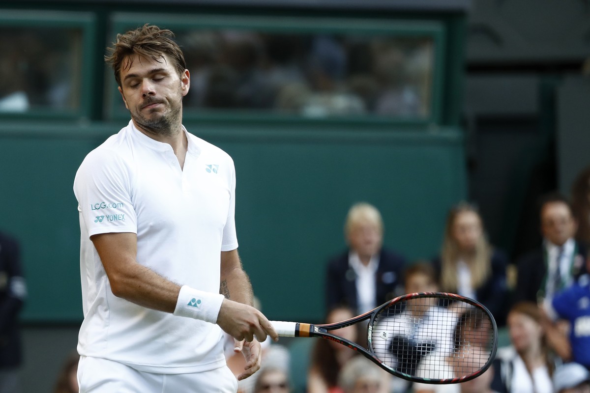 Stan Wawrinka of Switzerland reacts during his Men's Singles Match against Daniil Medvedev of Russia, on the opening day at the Wimbledon Tennis Championships in London Monday, July 3, 2017.(KEYS ...